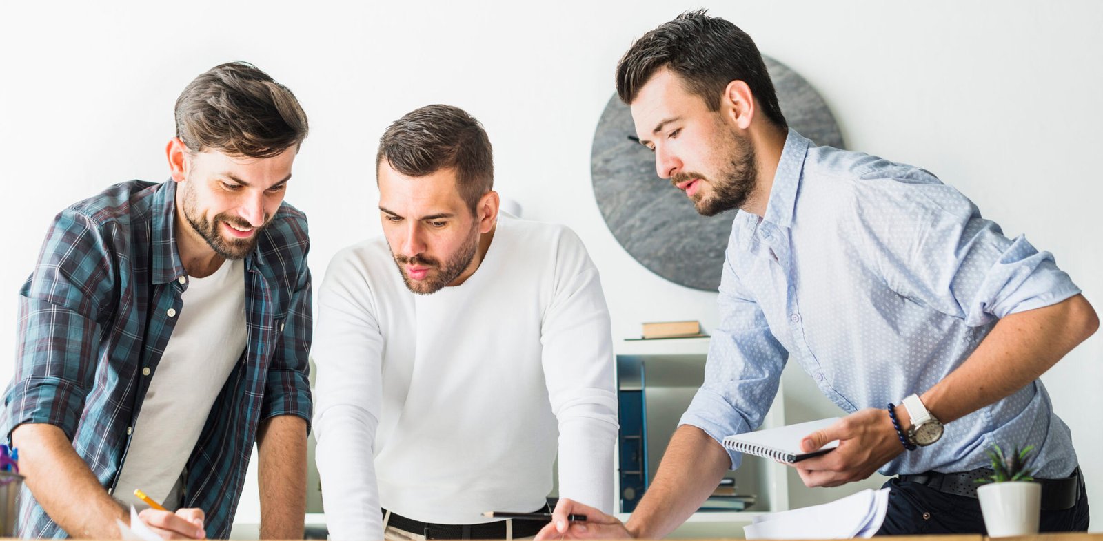 group-young-male-architect-working-office